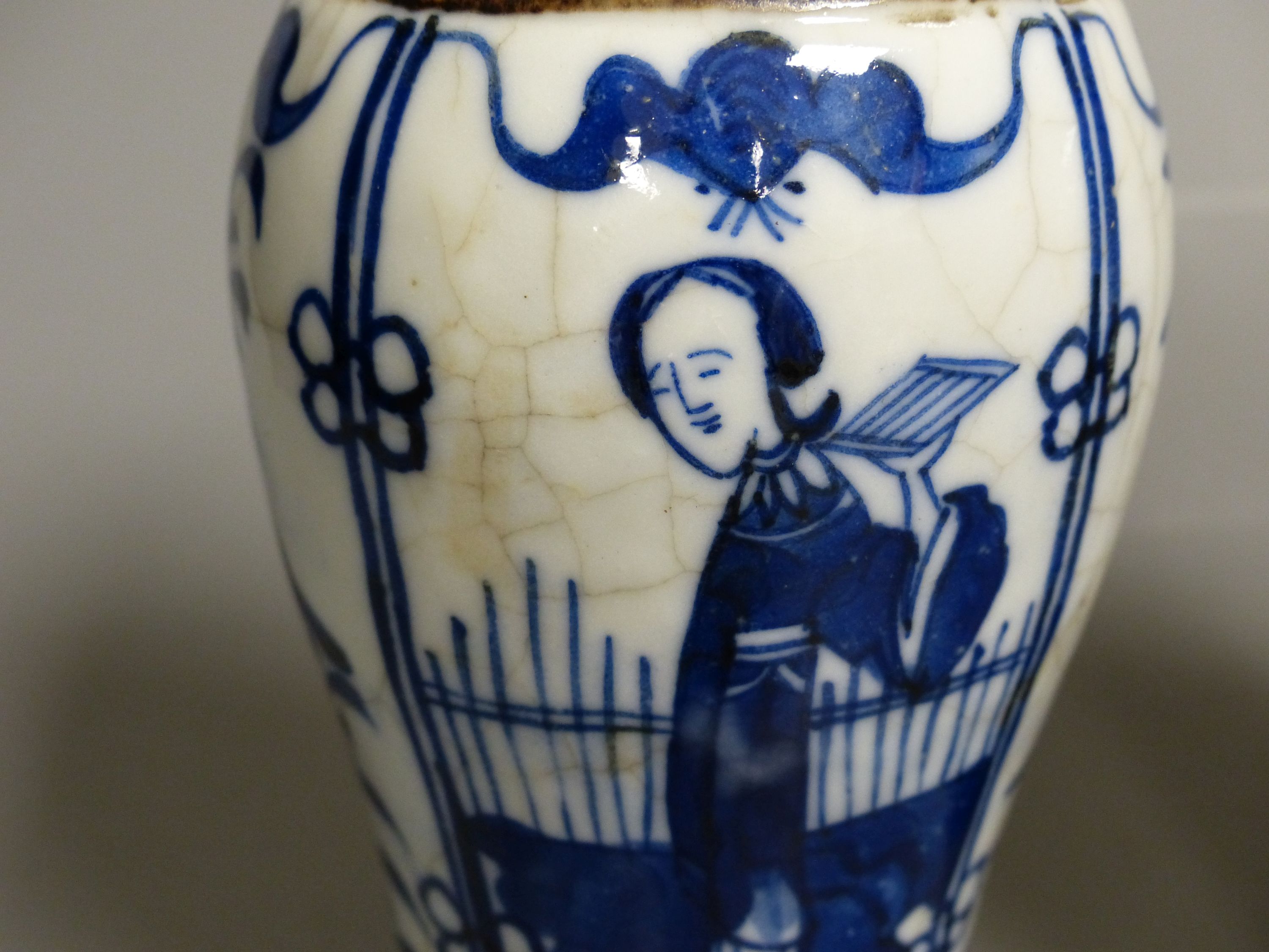 A pair of Chinese blue and white crackle glaze vases and covers, early 20th century, height 22cm